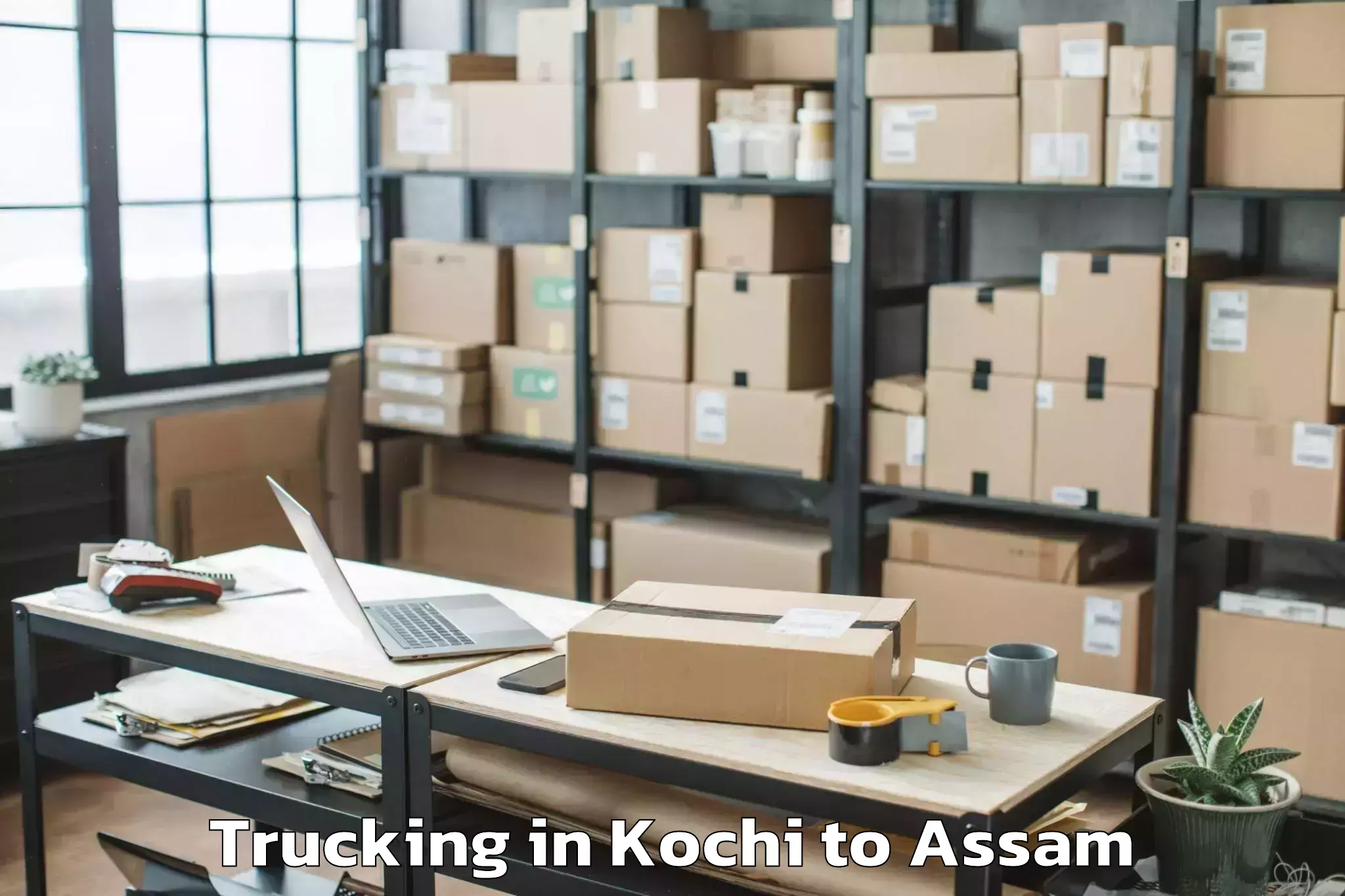 Reliable Kochi to Nazira Trucking